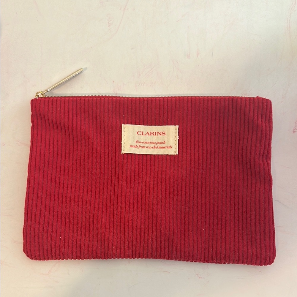 Clarins Red Cosmetic Bag with Zipper Closure and Textured Fabric